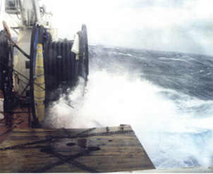 Waves crushing against vessel.